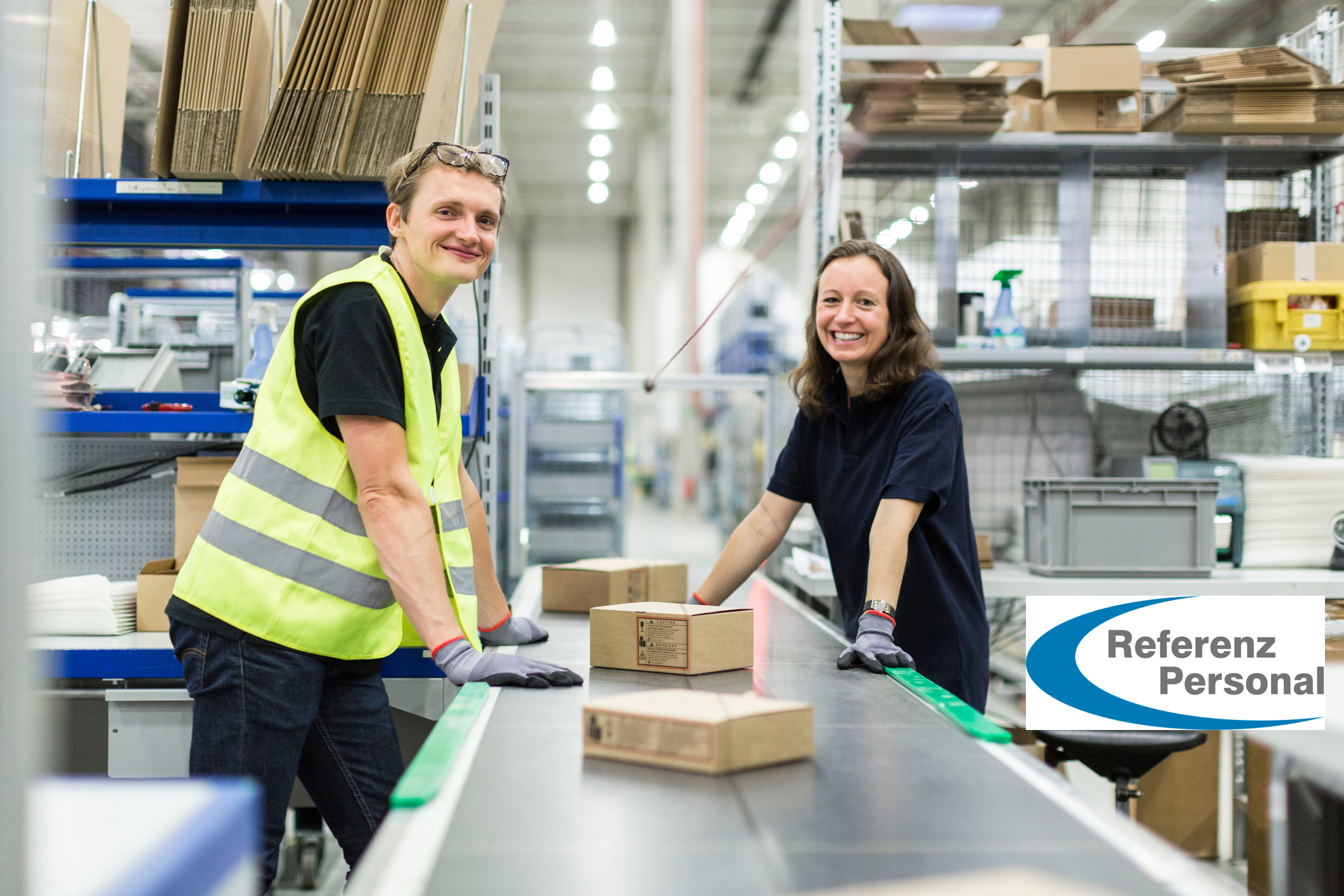 Young man and woman working in warehouse